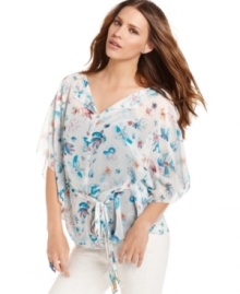 A watercolor floral print adds a flair of femininity to this RACHEL Rachel Roy chiffon blouse -- perfect for a light summer look! A watercolor floral print adds a flair of femininity to this RACHEL Rachel Roy chiffon blouse -- perfect for a light summer look!