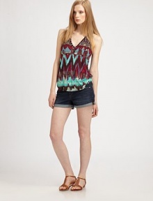 A vibrant tribal print lends a touch of boho chic to this effortless V-neck tank.V necklineSleevelessThree-button placketBaseball hemRacerbackAbout 26 from shoulder to hemRayonDry cleanMade in USAModel shown is 5'9½ (176cm) wearing US size Small. A vibrant tribal print lends a touch of boho chic to this effortless V-neck tank.V necklineSleevelessThree-button placketBaseball hemRacerbackAbout 26 from shoulder to hemRayonDry cleanMade in USAModel shown is 5'9½ (176cm) wearing US size Small.