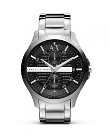 Sporty style gets extra sleek on this watch from Armani Exchange. Crafted of stainless steel, it flaunts a bold look with textured two eye chronograph and silvery accents. Sporty style gets extra sleek on this watch from Armani Exchange. Crafted of stainless steel, it flaunts a bold look with textured two eye chronograph and silvery accents.