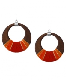 Thread together your perfect look. Kenneth Cole New York's chic style meshes a brown wood hoop setting wrapped in red and orange thread and silver tone wire. Approximate diameter: 2-3/4 inches. Thread together your perfect look. Kenneth Cole New York's chic style meshes a brown wood hoop setting wrapped in red and orange thread and silver tone wire. Approximate diameter: 2-3/4 inches.