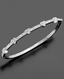 Let your love shine through with this sparkling bangle bracelet by Victoria Townsend. Featuring round-cut diamonds (1/4 ct. t.w.) set in sterling silver. Approximate diameter: 2-1/2 inches. Let your love shine through with this sparkling bangle bracelet by Victoria Townsend. Featuring round-cut diamonds (1/4 ct. t.w.) set in sterling silver. Approximate diameter: 2-1/2 inches.