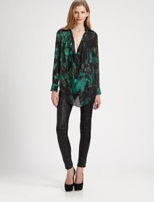 Electric print, lengthy silhouette and plunging cowlneck join for a striking translation of the classic silk button-down shirt. CowlneckLong sleeves with buttoned cuffsLonger length hits below the hipsSilkDry cleanImportedModel shown is 5'11 (178cm) wearing US size Small. Electric print, lengthy silhouette and plunging cowlneck join for a striking translation of the classic silk button-down shirt. CowlneckLong sleeves with buttoned cuffsLonger length hits below the hipsSilkDry cleanImportedModel shown is 5'11 (178cm) wearing US size Small.