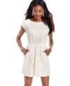 Front pockets give this flirty lace dress a sense of casual cool. A back cutout enhances its feminine charm! From Jolt.