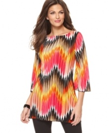 Bright zigzag stripes make a bold spring statement on this Alfani tunic -- perfect over the season's skinny jeans & leggings! Bright zigzag stripes make a bold spring statement on this Alfani tunic -- perfect over the season's skinny jeans & leggings!