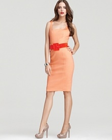Fitted in all the right places, this figure-hugging Alice + Olivia dress boasts a playful peachy hue and a striking crimson belt. Fitted in all the right places, this figure-hugging Alice + Olivia dress boasts a playful peachy hue and a striking crimson belt.