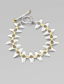 A unique design with tribal appeal in sleek sterling silver and radiant 24k gold. Sterling silver24k goldLength, about 7¼ Toggle closureImported A unique design with tribal appeal in sleek sterling silver and radiant 24k gold. Sterling silver24k goldLength, about 7¼ Toggle closureImported