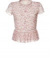 Stylish button down blouse in fine, pure ecru printed silk - Delicate, ultra-feminine raspberry print - Finely pleated front and sheer back - On-trend, peplumed waist with decorative lace trim - Small peter pan collar and short sleeves - Slim cut, hits at hips - Romantic, elegant and ultra-versatile - Pair with high waisted trousers, a pencil skirt or ankle-cropped trousers