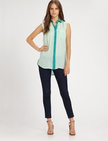 Dreamy silk chiffon elevates this tailored button-down finished with supple satin trim and a chic sleeveless silhouette.Point collarButton-down placketSleevelessLong sleeves with button cuffsHem is longer in backAbout 30 from shoulder to hemSilkDry cleanMade in USAModel shown is 5'10 (177cm) wearing US size Small. Dreamy silk chiffon elevates this tailored button-down finished with supple satin trim and a chic sleeveless silhouette.Point collarButton-down placketSleevelessLong sleeves with button cuffsHem is longer in backAbout 30 from shoulder to hemSilkDry cleanMade in USAModel shown is 5'10 (177cm) wearing US size Small.