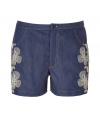 Chic denim shorts in fine, blue lyocell blend - Board short style in a supremely soft, flattering fabric - Floral embroidery at sides - Two pockets - Button closure and zip fly - Slim cut, shorts hit mid-thigh - Great for leisure or your next beach getaway - Pair with a billowy tunic top and sandals, or wear with a loose button down and platform wedges