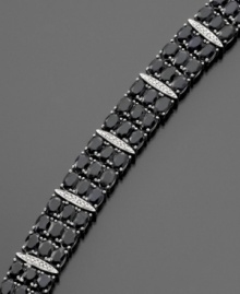 Decadent faceted black sapphire (50 ct. t.w.) gleams with intrigue on this beautiful sterling silver bracelet featuring diamond accents. Approximate length: 7-1/2 inches. Decadent faceted black sapphire (50 ct. t.w.) gleams with intrigue on this beautiful sterling silver bracelet featuring diamond accents. Approximate length: 7-1/2 inches.