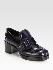 A large buckle tops this moccasin-inspired oxford silhouette, rendered in glossy patent leather. Stacked heel, 2¼ (60mm)Stacked platform, ½ (15mm)Compares to a 1¾ heel (45mm)Patent leather upperAdjustable buckle strapLeather lining and solePadded insoleMade in ItalyThis style runs small. We recommend ordering one half size up for a standard fit. A large buckle tops this moccasin-inspired oxford silhouette, rendered in glossy patent leather. Stacked heel, 2¼ (60mm)Stacked platform, ½ (15mm)Compares to a 1¾ heel (45mm)Patent leather upperAdjustable buckle strapLeather lining and solePadded insoleMade in ItalyThis style runs small. We recommend ordering one half size up for a standard fit.