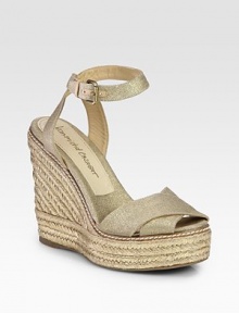 Espadrille wedge and canvas straps with a shimmering metallic finish. Hemp-covered wedge, 5 (125mm)Hemp-covered platform, 1 (25mm)Compares to a 4 heel (100mm)Metallic canvas and leather upperAdjustable ankle strapLeather and canvas liningRubber soleImported Espadrille wedge and canvas straps with a shimmering metallic finish. Hemp-covered wedge, 5 (125mm)Hemp-covered platform, 1 (25mm)Compares to a 4 heel (100mm)Metallic canvas and leather upperAdjustable ankle strapLeather and canvas liningRubber soleImported