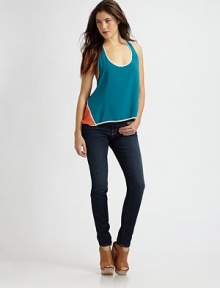 Vibrant and gauzy in an oversized scoopneck tank finished with chic colorblock details.ScoopneckSleevelessRacerbackAbout 30 from shoulder to hemRayonDry cleanMade in USA of imported fabricModel shown is 5'8½ (174cm) wearing US size Small. Vibrant and gauzy in an oversized scoopneck tank finished with chic colorblock details.ScoopneckSleevelessRacerbackAbout 30 from shoulder to hemRayonDry cleanMade in USA of imported fabricModel shown is 5'8½ (174cm) wearing US size Small.