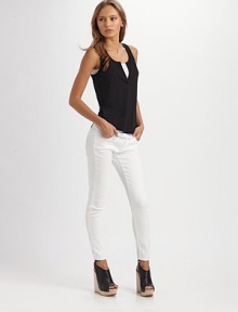 Comfy cotton scoopneck with a split neckline and curved hi-low hem. Split scoopneckSleevelessCurved back hi-low hemCottonDry cleanImported Comfy cotton scoopneck with a split neckline and curved hi-low hem. Split scoopneckSleevelessCurved back hi-low hemCottonDry cleanImported