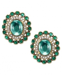 Timeless beauty from Bar III. Emerald-colored crystals are gently placed on an oval silhouette on these lovely earrings. Crafted in gold tone mixed metal. Approximate diameter: 1 inch. Timeless beauty from Bar III. Emerald-colored crystals are gently placed on an oval silhouette on these lovely earrings. Crafted in gold tone mixed metal. Approximate diameter: 1 inch.