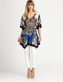 Supple silk, cut in a fluttering poncho silhouette and patterned with a kinetic, colorful paisley print.V necklineFront buttonsShort cape sleevesBanded waistAsymmetrical hemlineAbout 22 from natural waistSilkDry cleanMade in Italy of imported fabricModel shown is 5'11 (180cm) wearing US size Small. Supple silk, cut in a fluttering poncho silhouette and patterned with a kinetic, colorful paisley print.V necklineFront buttonsShort cape sleevesBanded waistAsymmetrical hemlineAbout 22 from natural waistSilkDry cleanMade in Italy of imported fabricModel shown is 5'11 (180cm) wearing US size Small.