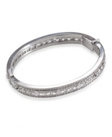Let your inner-diva shine with this sparkling bangle by Carolee. Bracelet features silvertone mixed metal with diamond and circular-shaped glass crystals. Approximate diameter: 3-1/2 inches. Let your inner-diva shine with this sparkling bangle by Carolee. Bracelet features silvertone mixed metal with diamond and circular-shaped glass crystals. Approximate diameter: 3-1/2 inches.