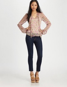 Ultra-feminine, semi-sheer confection with a delicate floral print, self tie at the neck and long bell sleeves. Scoopneck with self tieLong bell sleevesPolyesterMachine washImportedModel shown is 5'9½ (176cm) wearing US size Small. Ultra-feminine, semi-sheer confection with a delicate floral print, self tie at the neck and long bell sleeves. Scoopneck with self tieLong bell sleevesPolyesterMachine washImportedModel shown is 5'9½ (176cm) wearing US size Small.
