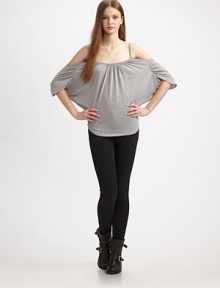 Shirred, open-sleeve scoopneck with an enticingly low scoopback. Scoopneck Open sleeves Scoopback Longer length hits below the hips 70% viscose/30% polyester Machine wash Imported Shirred, open-sleeve scoopneck with an enticingly low scoopback. Scoopneck Open sleeves Scoopback Longer length hits below the hips 70% viscose/30% polyester Machine wash Imported