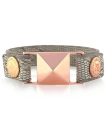 Make a fierce fashion statement. BCBGeneration's PVC snap bracelet features a neutral colored snake-skin pattern with accents crafted from rose gold-tone mixed metal, including a bold pyramid stud. Approximate length: 8 inches. Make a fierce fashion statement. BCBGeneration's PVC snap bracelet features a neutral colored snake-skin pattern with accents crafted from rose gold-tone mixed metal, including a bold pyramid stud. Approximate length: 8 inches.