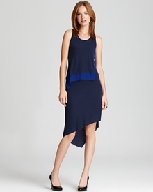 Asymmetrical, streamlined and slinky, this BCBGMAXAZRIA dress has all the makings of youthful, modern elegance. Asymmetrical, streamlined and slinky, this BCBGMAXAZRIA dress has all the makings of youthful, modern elegance.