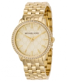 Decadent style that glistens and glitters. This Lady Nini collection watch from Michael Kors features a goldtone ion-plaged stainless steel bracelet and round case. Crystal accents at bezel. Light champagne dial with MK argyle pattern, goldtone stick indices and logo. Quartz movement. Water resistant to 50 meters. Two-year limited warranty. Decadent style that glistens and glitters. This Lady Nini collection watch from Michael Kors features a goldtone ion-plaged stainless steel bracelet and round case. Crystal accents at bezel. Light champagne dial with MK argyle pattern, goldtone stick indices and logo. Quartz movement. Water resistant to 50 meters. Two-year limited warranty.
