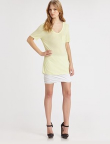 Dropped shoulders and a patch pocket enhance this lengthy, lightweight v-neck. Rounded v-neckDropped shouldersShort sleevesFront patch pocketLonger length hits below the hipsRayonHand washImportedModel shown is 5'9½ (176cm) wearing US size Small. Dropped shoulders and a patch pocket enhance this lengthy, lightweight v-neck. Rounded v-neckDropped shouldersShort sleevesFront patch pocketLonger length hits below the hipsRayonHand washImportedModel shown is 5'9½ (176cm) wearing US size Small.