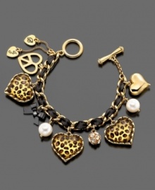 Accessorize with a little jungle love. This Betsey Johnson charm bracelet features leopard heart charms, crystal accents and imitation pearls set in goldtone mixed metal. Approximate length: 7 inches. Approximate charm drop: 1 inch. Accessorize with a little jungle love. This Betsey Johnson charm bracelet features leopard heart charms, crystal accents and imitation pearls set in goldtone mixed metal. Approximate length: 7 inches. Approximate charm drop: 1 inch.