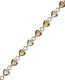 A romantic twist. Giani Bernini's tri-tone heart bracelet combines sterling silver, 24k gold and 24k rose gold over sterling silver. Approximate length: 7-1/4 inches. A romantic twist. Giani Bernini's tri-tone heart bracelet combines sterling silver, 24k gold and 24k rose gold over sterling silver. Approximate length: 7-1/4 inches.