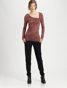 Flatter your figure with allover ruching and an asymmetrically twisted neckline. Asymmetrically twisted necklineLong sleevesAllover ruchingLonger length hits below the hipsMicro modalDry cleanImported of Italian fabricModel shown is 5'10 (177cm) wearing US size Small. Flatter your figure with allover ruching and an asymmetrically twisted neckline. Asymmetrically twisted necklineLong sleevesAllover ruchingLonger length hits below the hipsMicro modalDry cleanImported of Italian fabricModel shown is 5'10 (177cm) wearing US size Small.