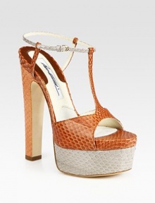An exotic take on the colorblock trend, this snakeskin t-strap has an adjustable ankle strap and towering heel and platform. Self-covered heel, 5½ (140mm)Covered platform, 2 (50mm)Compares to a 3½ heel (90mm)Snakeskin upperLeather lining and solePadded insoleMade in ItalyOUR FIT MODEL RECOMMENDS ordering one half size up as this style runs small. An exotic take on the colorblock trend, this snakeskin t-strap has an adjustable ankle strap and towering heel and platform. Self-covered heel, 5½ (140mm)Covered platform, 2 (50mm)Compares to a 3½ heel (90mm)Snakeskin upperLeather lining and solePadded insoleMade in ItalyOUR FIT MODEL RECOMMENDS ordering one half size up as this style runs small.