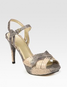 Textured Italian leather in a posh snake print with an adjustable ankle strap and a covered platform. Self-covered heel, 4 (100mm)Covered platform, 1 (25mm)Compares to a 3 heel (75mm)Snake-print leather upperLeather lining and solePadded insoleMade in SpainOUR FIT MODEL RECOMMENDS ordering true whole size; ½ sizes should order the next whole size down. 