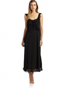 THE LOOKV-neck with bow detailRuffled neckline and strapsRuffled hemTHE FITAbout 50 from shoulder to hemTHE MATERIALPolyester/rayonCARE & ORIGINMachine washImportedModel shown is 5'9 (175cm) wearing US size Small. THE LOOKV-neck with bow detailRuffled neckline and strapsRuffled hemTHE FITAbout 50 from shoulder to hemTHE MATERIALPolyester/rayonCARE & ORIGINMachine washImportedModel shown is 5'9 (175cm) wearing US size Small.