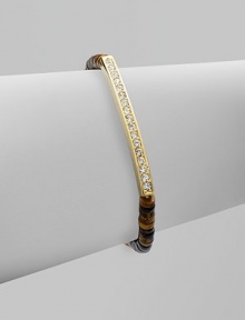 Beautifully textured tiger's eye-inspired beads accented with a rhinestone encrusted bar and a logo detailed tag. Epoxy beadsGlass stonesGoldtone brassDiameter, about 2¼ stretchableSlip-on styleImported 