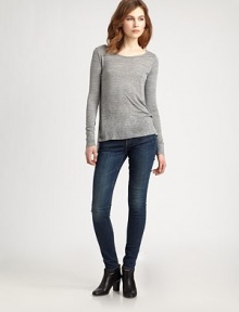 Softly heathered viscose in a shapely swing-back styled with a slashed hi-lo hem.BoatneckLong sleevesFine ribbed trimViscoseDry cleanMade in ItalyModel shown is 5'11 (180cm) wearing US size Small. Softly heathered viscose in a shapely swing-back styled with a slashed hi-lo hem.BoatneckLong sleevesFine ribbed trimViscoseDry cleanMade in ItalyModel shown is 5'11 (180cm) wearing US size Small.