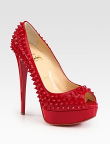 A towering heel and platform elevate this peep toe silhouette of shiny patent leather with edgy studs. Self-covered heel, 5¾ (145mm)Covered platform, ¾ (20mm)Compares to a 5 heel (125mm)Studded patent leather upperPeep toeLeather liningSignature red leather solePadded insoleMade in Italy A towering heel and platform elevate this peep toe silhouette of shiny patent leather with edgy studs. Self-covered heel, 5¾ (145mm)Covered platform, ¾ (20mm)Compares to a 5 heel (125mm)Studded patent leather upperPeep toeLeather liningSignature red leather solePadded insoleMade in Italy