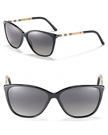 Burberry's stylish cat eye features a sleek silhouette and check wrapped temples. Burberry's stylish cat eye features a sleek silhouette and check wrapped temples.