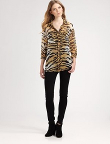 Semi-sheer silk top supercharged by a wildly chic tiger print. Point collarButton frontLong sleeves with buttoned cuffsShirttail hem hits below the hipsSilkDry cleanImportedModel shown is 5'10 (177cm) wearing US size Small.This style runs true to size. We recommend ordering your usual size for a standard fit. Semi-sheer silk top supercharged by a wildly chic tiger print. Point collarButton frontLong sleeves with buttoned cuffsShirttail hem hits below the hipsSilkDry cleanImportedModel shown is 5'10 (177cm) wearing US size Small.This style runs true to size. We recommend ordering your usual size for a standard fit.
