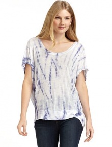 THE LOOKAllover tie dye designDolman sleevesBanded hemTHE FITAbout 29 from shoulder to hemTHE MATERIALRayonCARE & ORIGINMachine washMade in USAModel shown is 5'10 (177cm) wearing US size Small. THE LOOKAllover tie dye designDolman sleevesBanded hemTHE FITAbout 29 from shoulder to hemTHE MATERIALRayonCARE & ORIGINMachine washMade in USAModel shown is 5'10 (177cm) wearing US size Small.