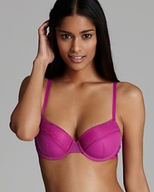 Calvin Klein does the demi-cup balconette with a mesh overlay and delicate lace trim for peeking out of low-cut tops. Style #F3517.