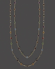 A brilliant medley of faceted semi-precious stones set in a long, luxe 14K yellow gold necklace A brilliant medley of faceted semi-precious stones set in a long, luxe 14K yellow gold necklace