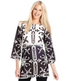Fill your wardrobe with charismatic contrast: This tunic top from Sunny Leigh does the trick with a bold black-and-white print. Fill your wardrobe with charismatic contrast: This tunic top from Sunny Leigh does the trick with a bold black-and-white print.
