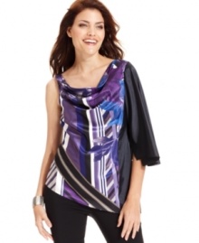 T Tahari makes a stylish statement by boldly blending a floral print with a geometric motif for this stunning one-shoulder blouse. T Tahari makes a stylish statement by boldly blending a floral print with a geometric motif for this stunning one-shoulder blouse.