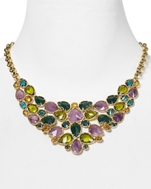 A statement making necklace crafted of luminous 12-karat gold plate, faceted gemstones in a dramatic color palette define this Carolee showpiece. A statement making necklace crafted of luminous 12-karat gold plate, faceted gemstones in a dramatic color palette define this Carolee showpiece.