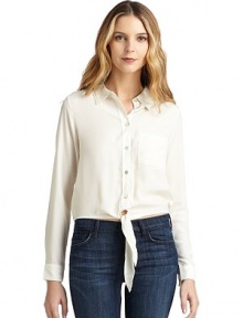 THE LOOKShirt collarFront button closureLong button cuff sleeves Chest patch pocketTie detail at hemGathered back yokeElastic back hemTHE FITAbout 17 from shoulder to hemTHE MATERIALPolyesterCARE & ORIGINHand washImportedModel shown is 5'10 (177cm) wearing US size Small. THE LOOKShirt collarFront button closureLong button cuff sleeves Chest patch pocketTie detail at hemGathered back yokeElastic back hemTHE FITAbout 17 from shoulder to hemTHE MATERIALPolyesterCARE & ORIGINHand washImportedModel shown is 5'10 (177cm) wearing US size Small.