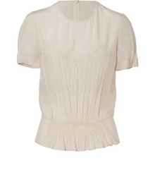 Elegant top in pure, ecru silk - Short, cuffed sleeves, round neck and back zip - Slim cut, billows slightly above hips before tapering - Gently pleated at chest and shoulders - Feminine and romantic, perfect for day or evening - Pair with a skinny jean or leather pencil skirt and platform pumps or ankle booties