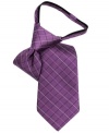 Etched in silk. This grid tie from Calvin Klein will give his buttoned-up look a classic finish with a simple zip closure.