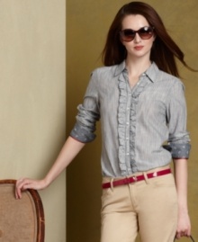 Strike a feminine note in Tommy Hilfiger's striped button-down shirt, complete with crisp ruffled trim at the placket. Strike a feminine note in Tommy Hilfiger's striped button-down shirt, complete with crisp ruffled trim at the placket.