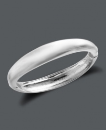Add a Touch of Silver with this polished style. This smooth hinge bangle slips on easily and shimmers in silver over zinc alloy. Approximate diameter: 2-1/3 inches. Approximate bangle width: 2/5 inch to 1/2 inch. Add a Touch of Silver with this polished style. This smooth hinge bangle slips on easily and shimmers in silver over zinc alloy. Approximate diameter: 2-1/3 inches. Approximate bangle width: 2/5 inch to 1/2 inch.