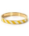 What's your mantra? These bold bangles from kate spade new york spell it out with interior engraving. This one reads: TOE THE LINE.